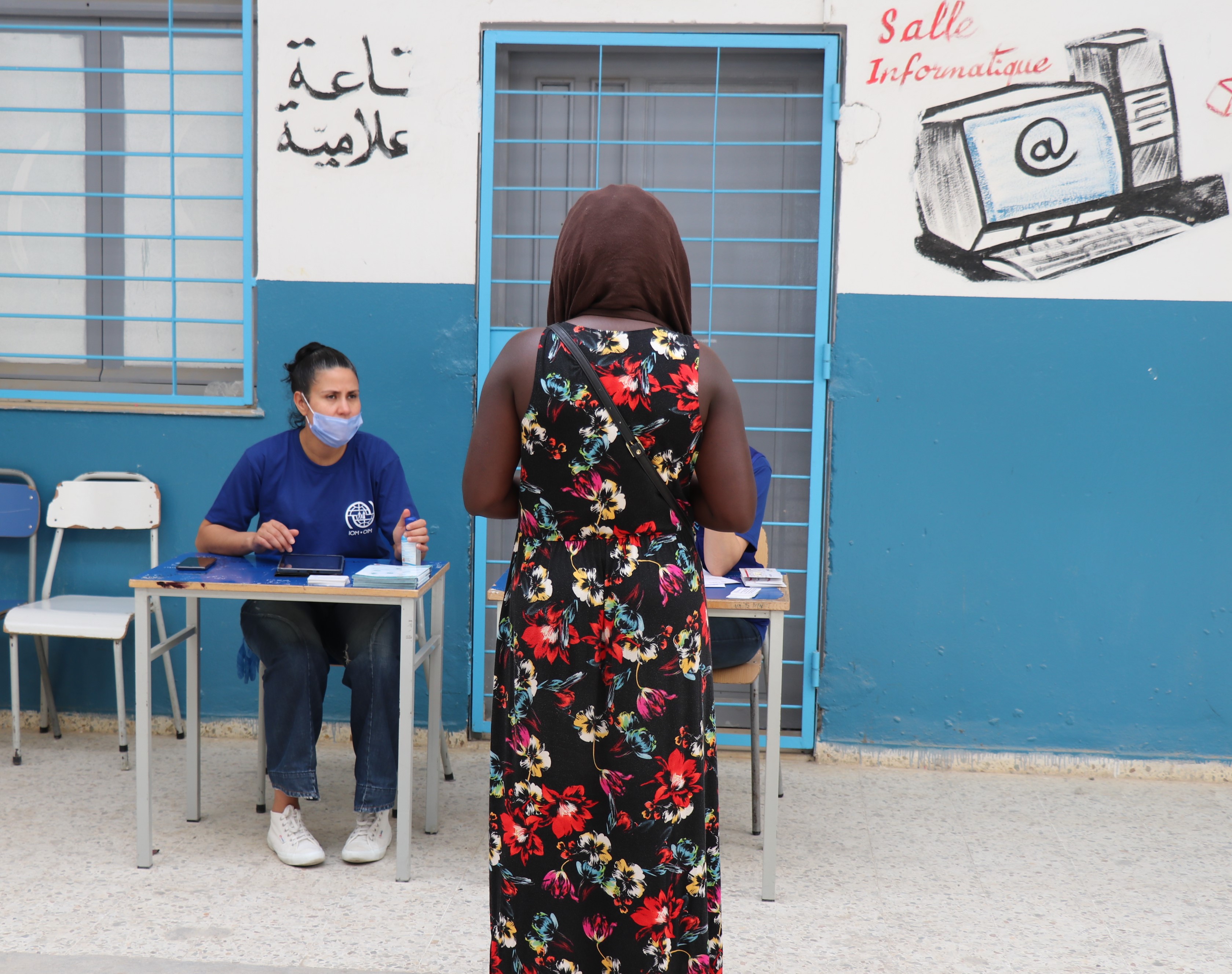 The EU-IOM Joint Initiative delivered vouchers to a migrant in Tunisia. ©IOM